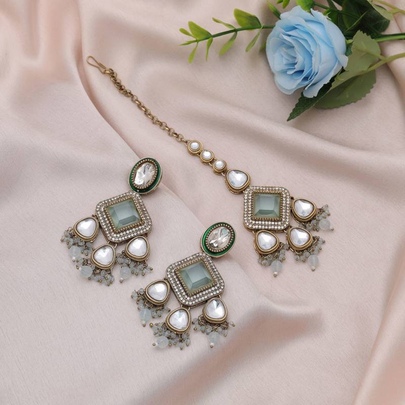 Sky blue color kundan earrings tikka set