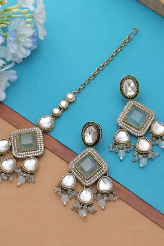 Sky blue color kundan earrings tikka set