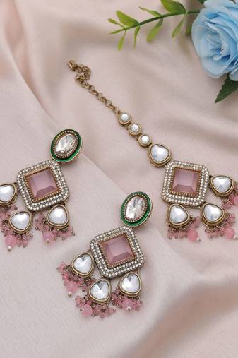 Light pink color kundan earrings tikka set