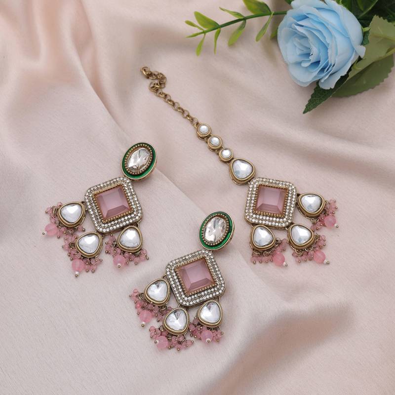 Light pink color kundan earrings tikka set