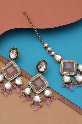 Light pink color kundan earrings tikka set