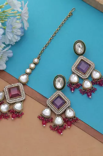 Rani color kundan earrings tikka set
