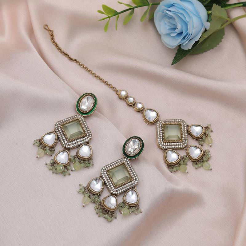 Pista green color kundan earrings tikka set
