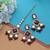 Maroon color kundan earrings tikka set