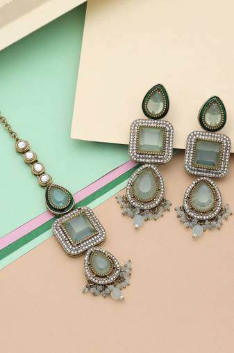 Sky blue color kundan earrings tikka set