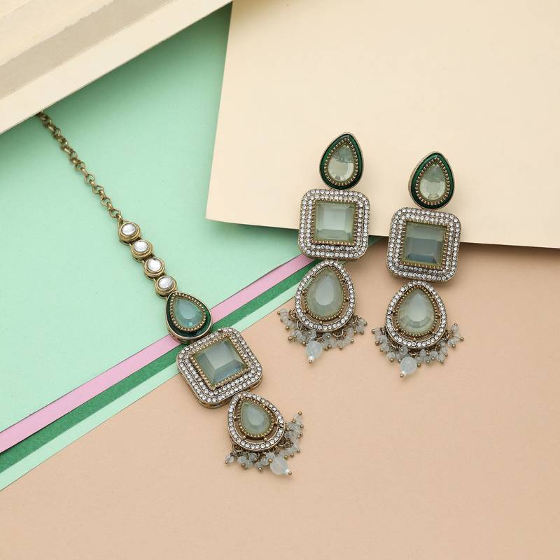 Sky blue color kundan earrings tikka set