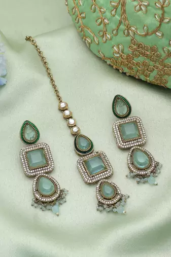 Sky blue color kundan earrings tikka set