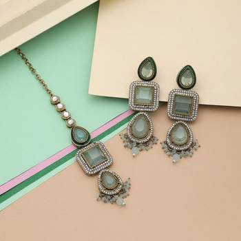 Pista green color kundan earrings tikka set 1