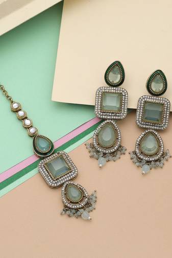 Pista green color kundan earrings tikka set