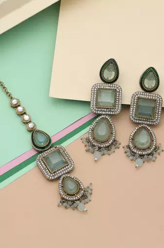 Pista green color kundan earrings tikka set