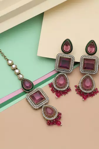 Rani color kundan earrings tikka set