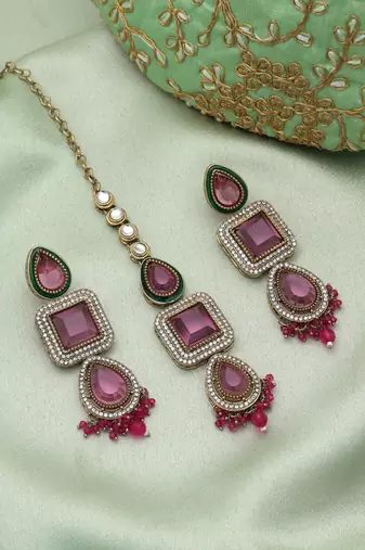 Rani color kundan earrings tikka set