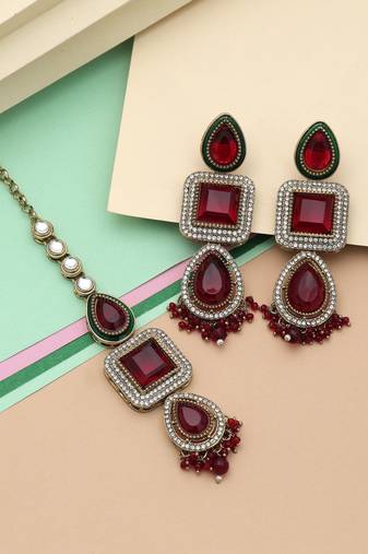 Maroon color kundan earrings tikka set