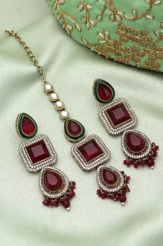 Maroon color kundan earrings tikka set