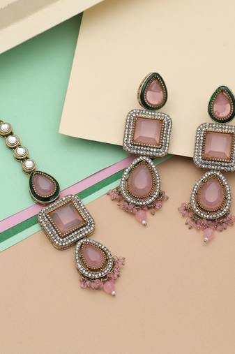 Light pink color kundan earrings tikka set