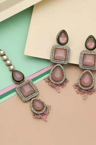 Light pink color kundan earrings tikka set