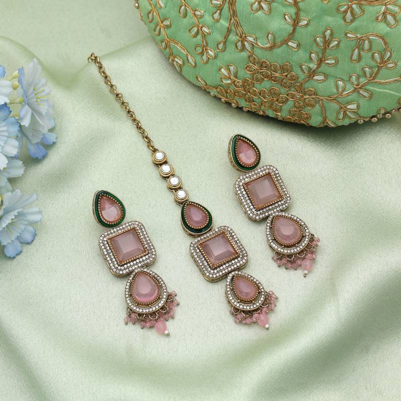 Light pink color kundan earrings tikka set