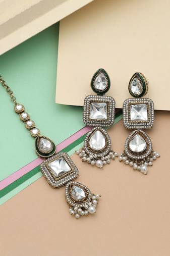 White color kundan earrings tikka set