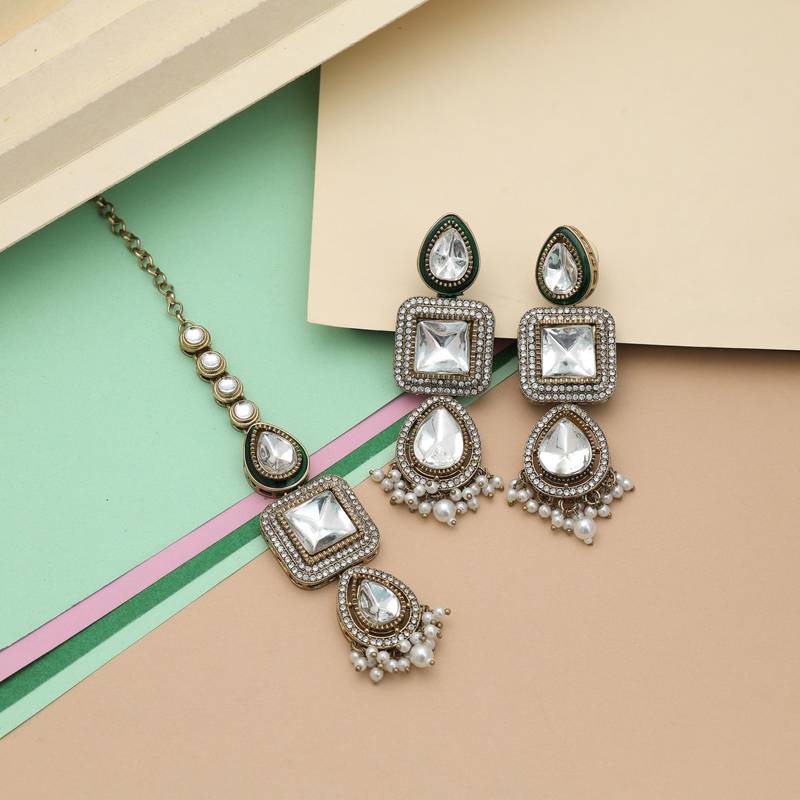 White color kundan earrings tikka set