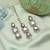 White color kundan earrings tikka set
