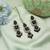 Black color kundan earrings tikka set