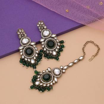 Green color kundan earrings tikka set 1