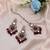 Maroon color kundan earrings tikka set