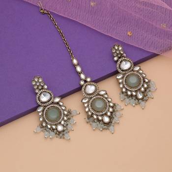 Sky blue color kundan earrings tikka set 1