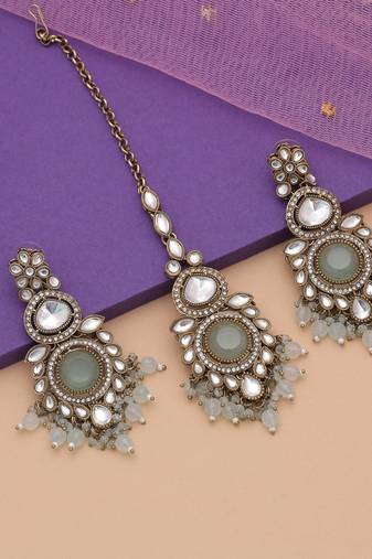 Sky blue color kundan earrings tikka set