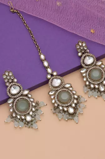 Sky blue color kundan earrings tikka set