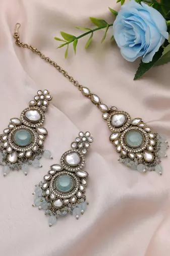 Sky blue color kundan earrings tikka set