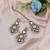 White color kundan earrings tikka set