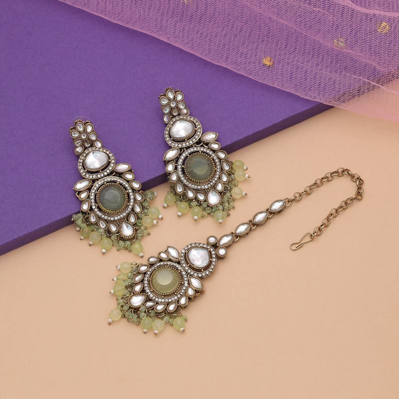 Pista green color kundan earrings tikka set