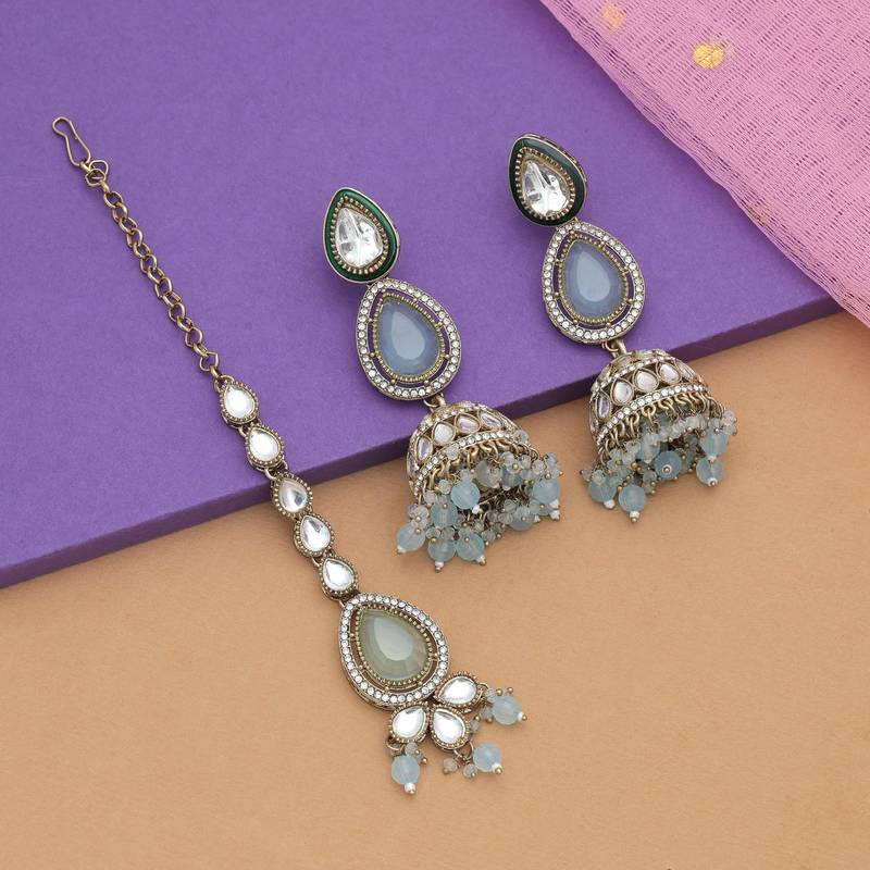 Sky blue color kundan earrings tikka set