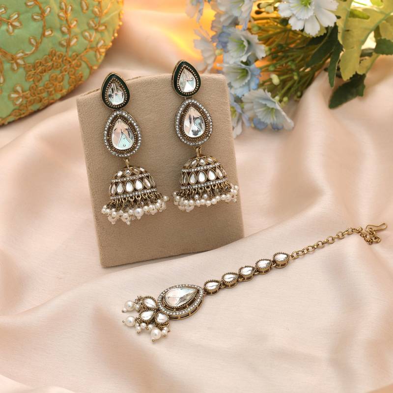 White color kundan earrings tikka set