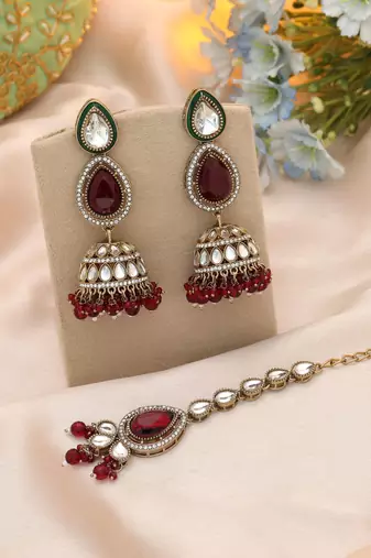 Maroon color kundan earrings tikka set