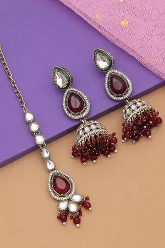 Maroon color kundan earrings tikka set
