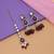 Maroon color kundan earrings tikka set
