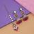 Rani color kundan earrings tikka set