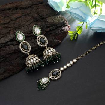 Green color kundan earrings tikka set 1