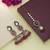 Rani color kundan earrings tikka set