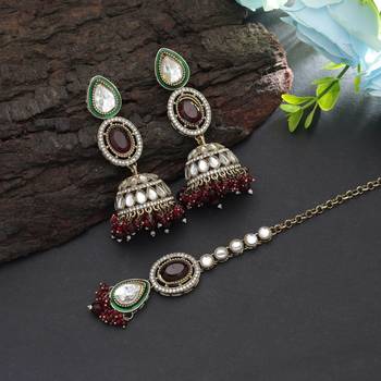 Maroon color kundan earrings tikka set 1