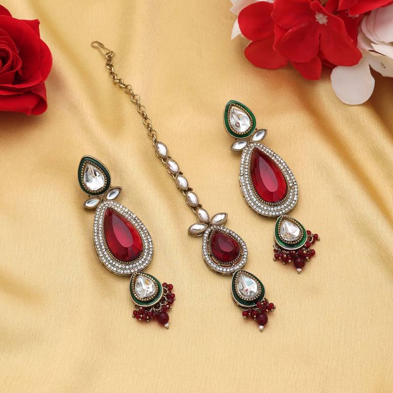 Maroon color kundan earrings tikka set