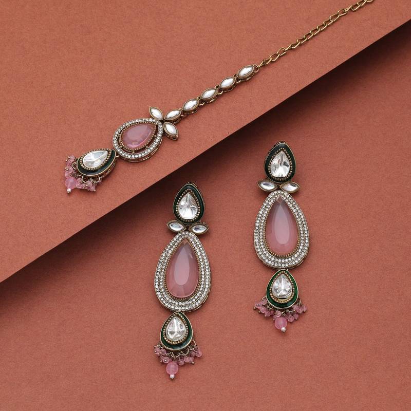 Light pink color kundan earrings tikka set