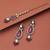 Rani color kundan earrings tikka set