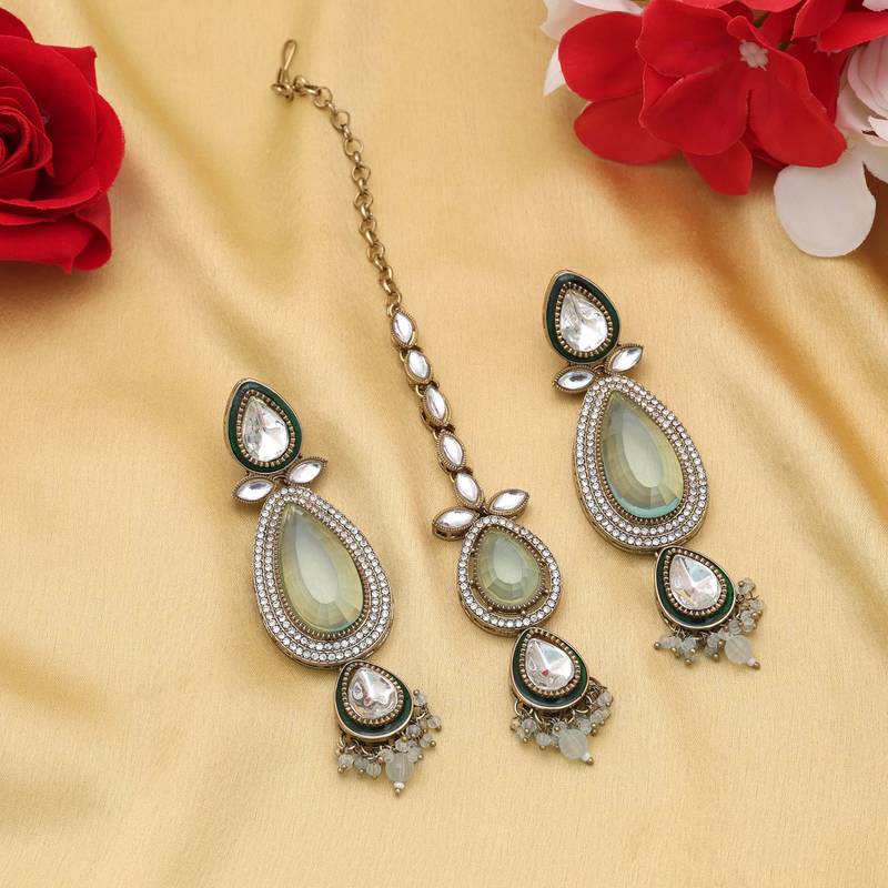 green color kundan earrings tikka set