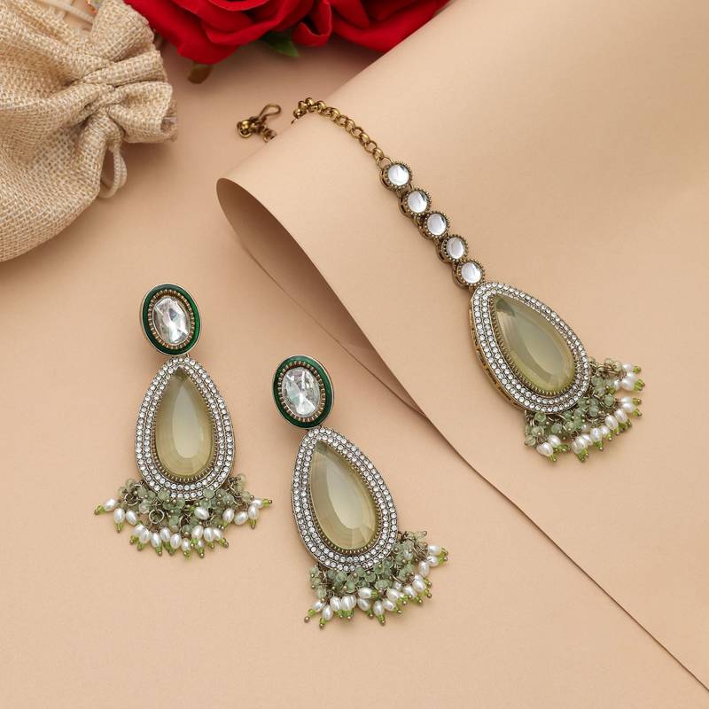 Pista green color kundan earrings tikka set