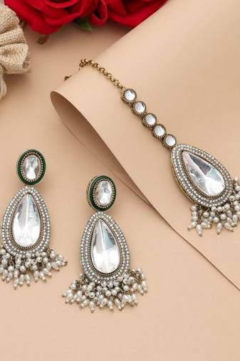 White color kundan earrings tikka set