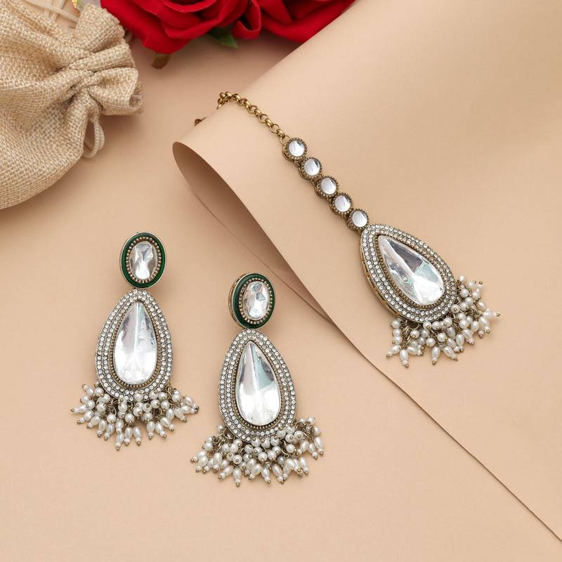 White color kundan earrings tikka set