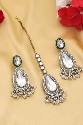 White color kundan earrings tikka set